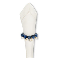 Servilletero de cuentas con conchas