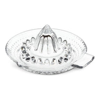 Presse-agrumes avec bec verseur et poignée