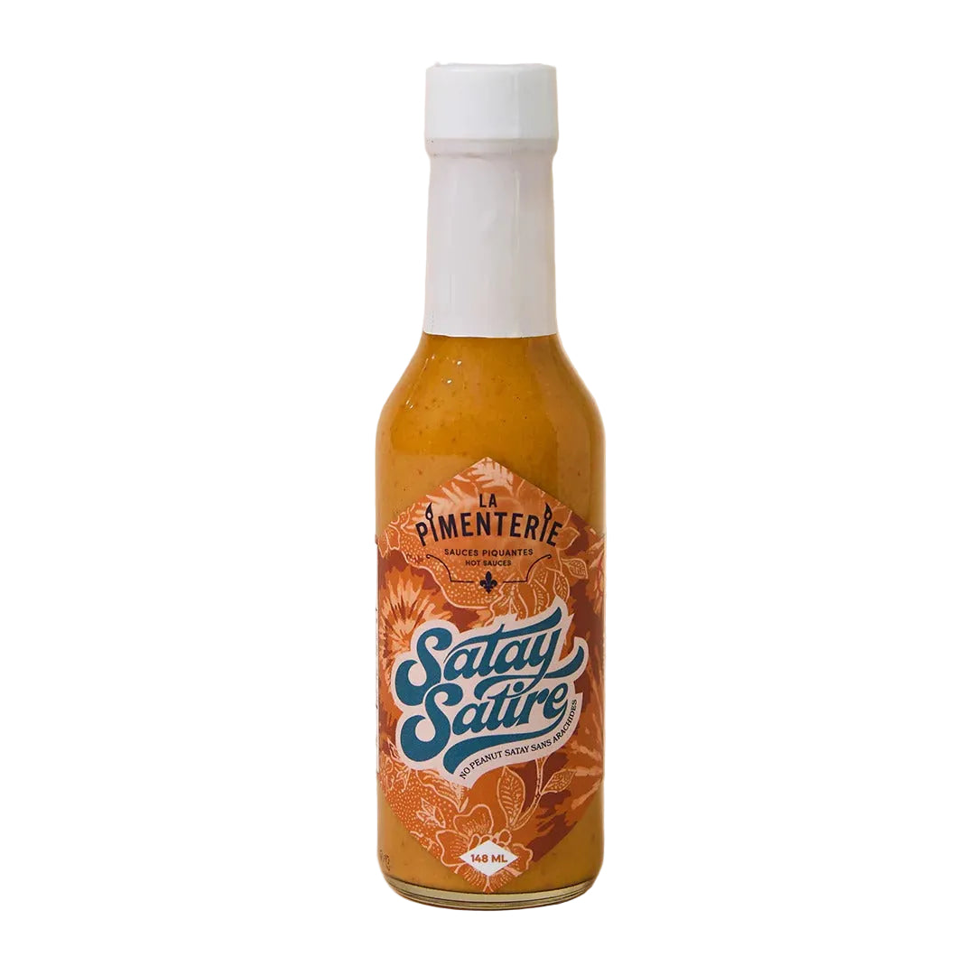 Bottle of Satay Satire hot sauce with a decorative label on a white background