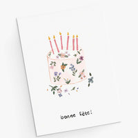 Carte de vœux d'anniversaire avec gâteau floral